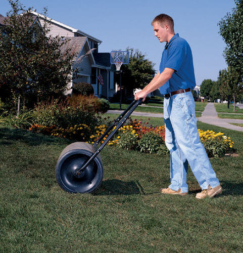 Man using lawn roller